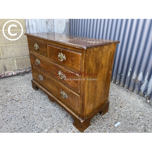 294 - An Edwardian chest of four drawers