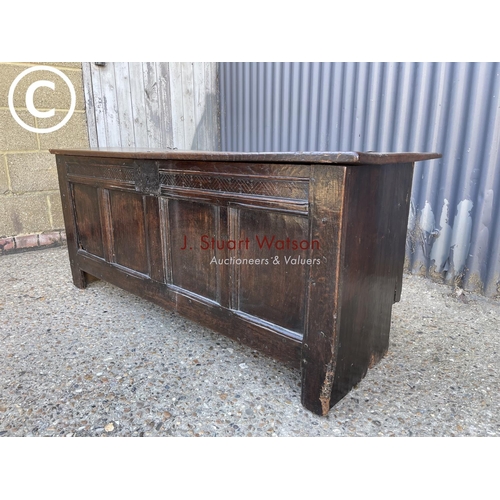 298 - An early oak blanket box coffer 135x50x60