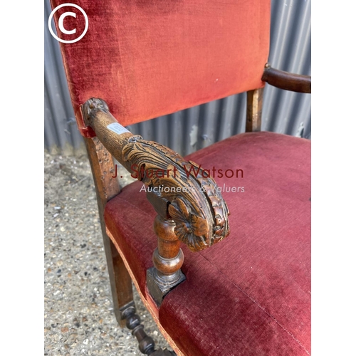 301 - A carved oak throne style chair