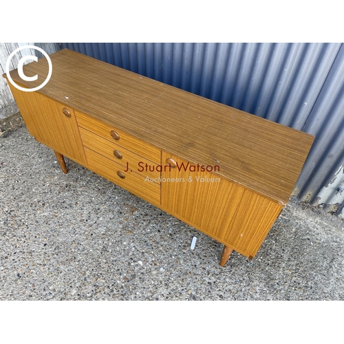 302 - A retro teak effect sideboard