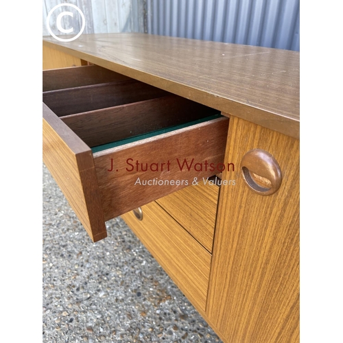 302 - A retro teak effect sideboard
