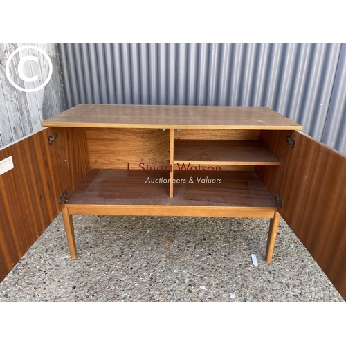 303 - A retro two door record cabinet / sideboard