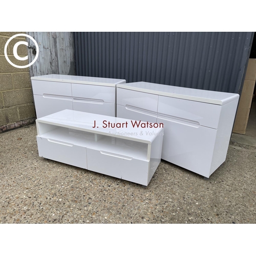 31 - A pair of white gloss sideboards together with a matching tv stand