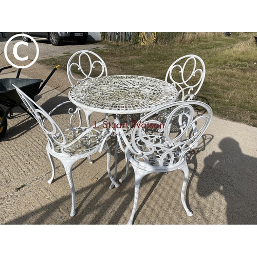 479 - White painted aluminium table and four  chairs