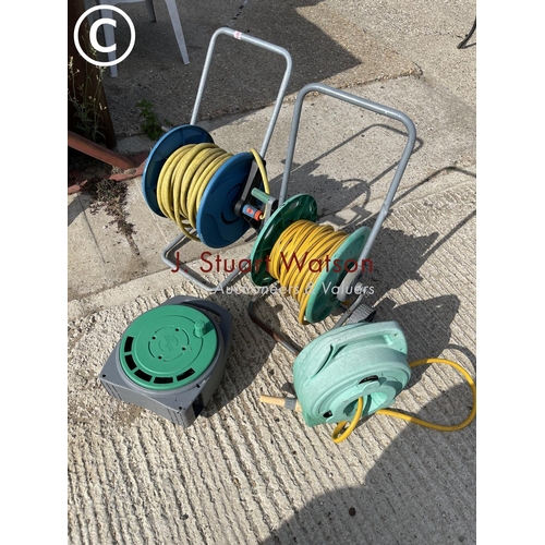 484 - Four hoses and reels