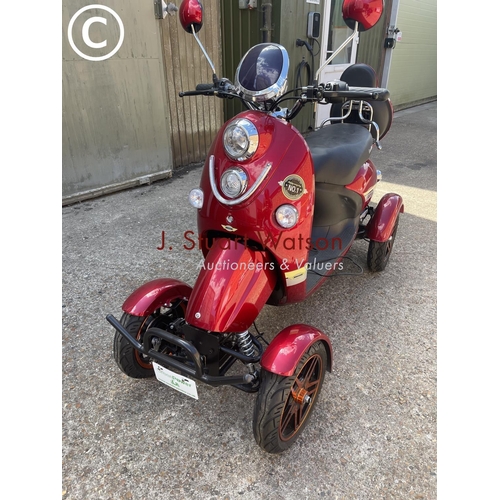 491 - A green power electric powered all terrain mobility scooter, with key and charger in working order -... 
