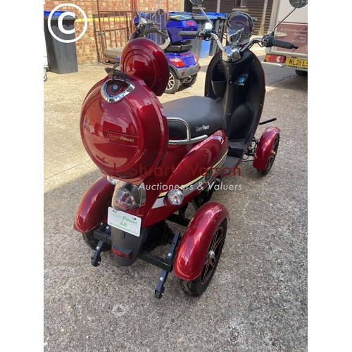 491 - A green power electric powered all terrain mobility scooter, with key and charger in working order -... 