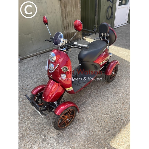 491 - A green power electric powered all terrain mobility scooter, with key and charger in working order -... 