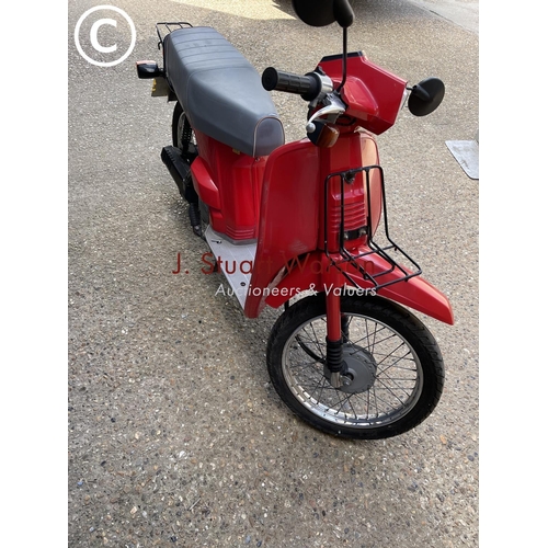 496 - S748 DGH Honda moped bike in running order. Odometer 7657 miles. 50cc. with rear lock box. Current V... 
