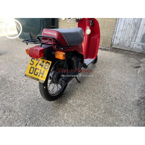 496 - S748 DGH Honda moped bike in running order. Odometer 7657 miles. 50cc. with rear lock box. Current V... 