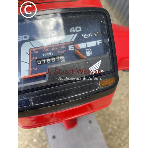 496 - S748 DGH Honda moped bike in running order. Odometer 7657 miles. 50cc. with rear lock box. Current V... 
