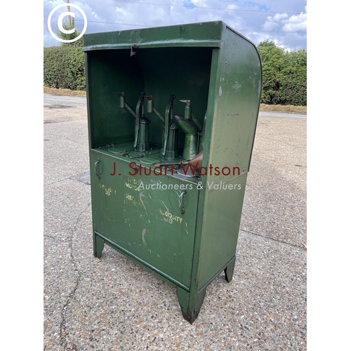 499 - A vintage green three pump oil dispensing cabinet, together with copper funnels and oil jug