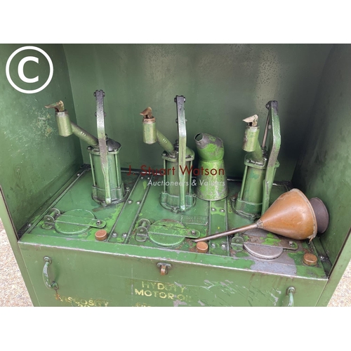 499 - A vintage green three pump oil dispensing cabinet, together with copper funnels and oil jug