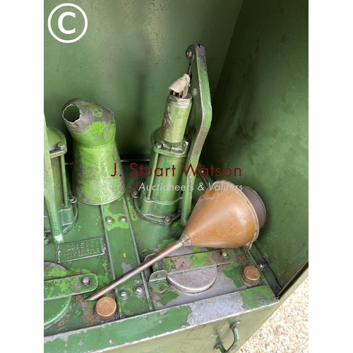499 - A vintage green three pump oil dispensing cabinet, together with copper funnels and oil jug