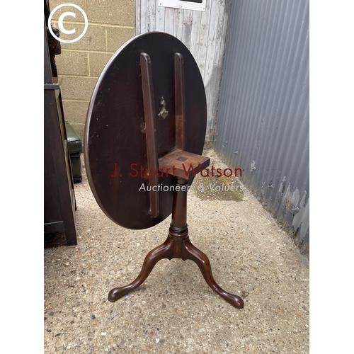 5 - A Georgian mahogany snap top table