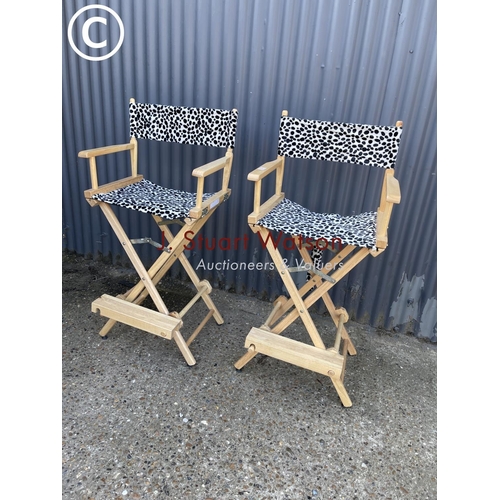 50 - A pair of spotted high folding directors chairs