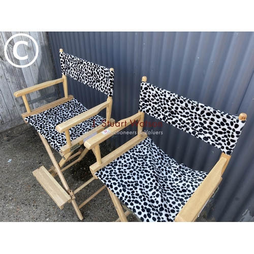 50 - A pair of spotted high folding directors chairs