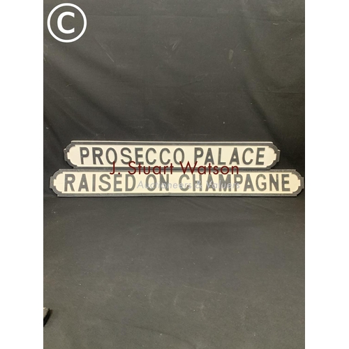 506 - 2 wooden signs, Raised on Champagne length 125cms and Prosecco palace,