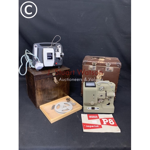 509 - 2 cased 8mm projectors
