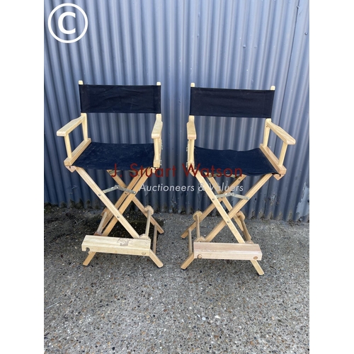 51 - A pair of black high folding directors chairs