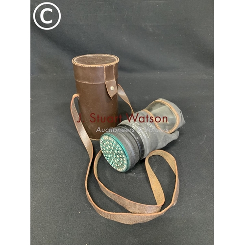 513 - WW2 period gas mask in original leather case