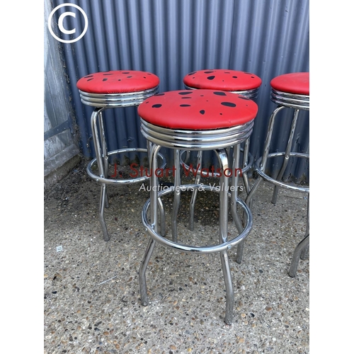 54 - A set of six chrome stools with red vinyl seats