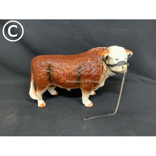 572 - Large Staffordshire pottery bull, height 26cms, length 42cms