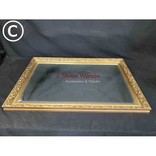 586 - Large gilt framed  rectangular mirror, 97 x 67cms