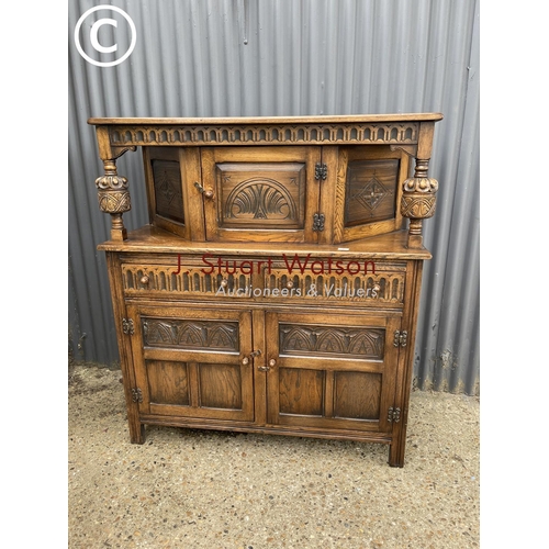 6 - A carved oak court cupboard sideboard