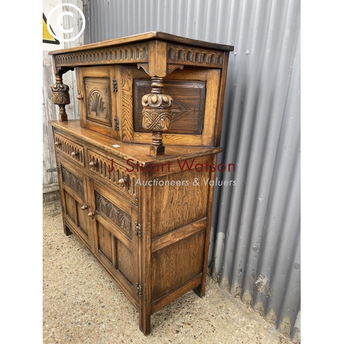 6 - A carved oak court cupboard sideboard