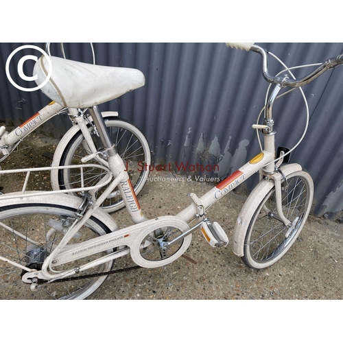 67 - A pair of vintage Raleigh folding compact bikes