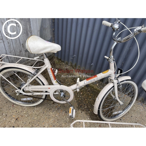 67 - A pair of vintage Raleigh folding compact bikes