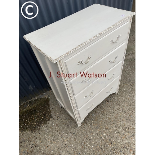 7 - A french style white painted chest of four drawers