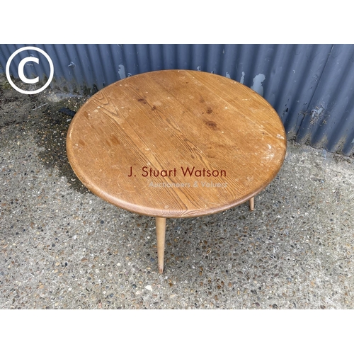 82 - An original elm Ercol coffee table