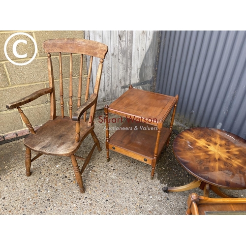 90 - A windsor carver chair, three yew coffee tables and mahogany wall rack