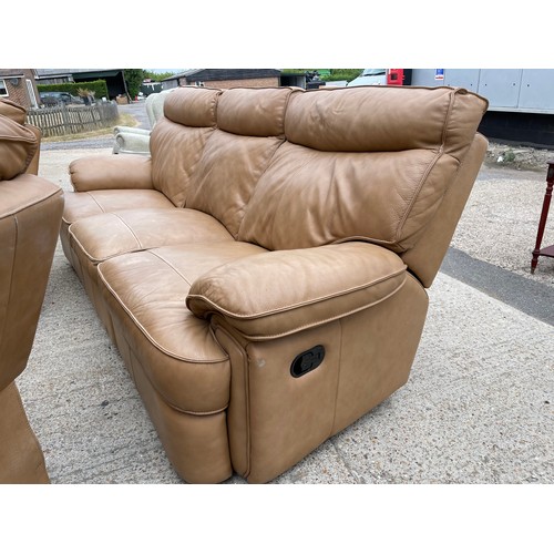 300b - A tan brown leather three piece lounge suite with 2 recliner chairs and double reclining three seate... 