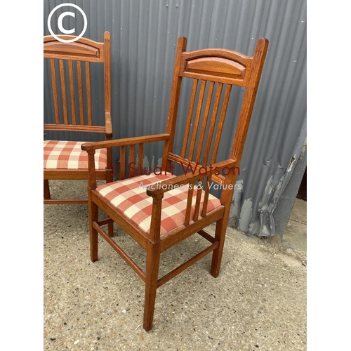 297 - A pair of oak carver chairs