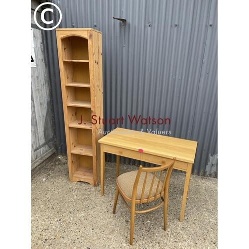 298 - A MODERN LIGHT OAK DESK, PINE BOOKCASE AND A CHAIR