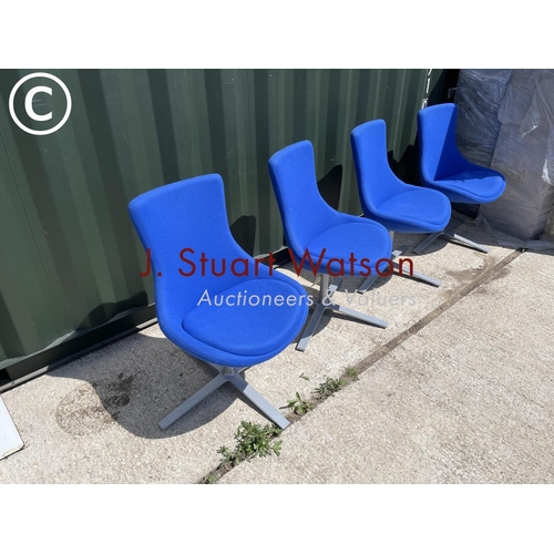 376 - A set of four blue upholstered bloom chairs by orange box