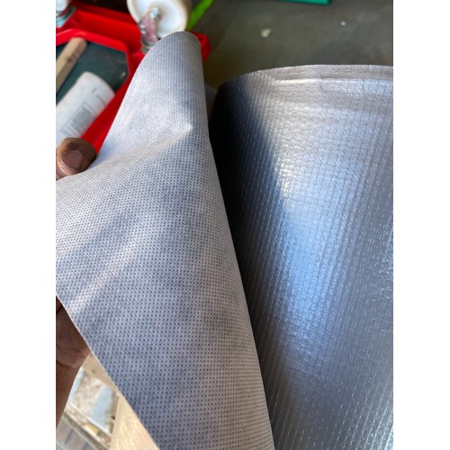 381 - Roll of silver / grey material / photography backing?