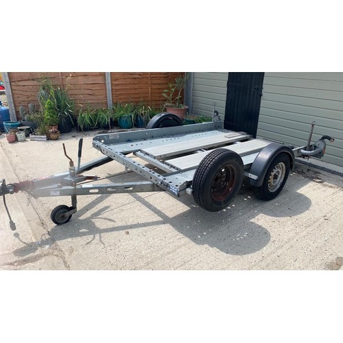 498 - A single axle compact car transporter trailer. Suitable for uusing behind motorhome etc. for small c... 