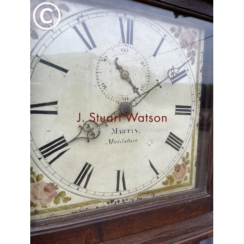 104 - An oak cased longcase clock by MARTIN of Maidstone with weight and pendulum (pendulum in AF)