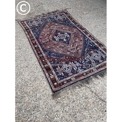 114 - A blue and red pattern oriental rug 140x215