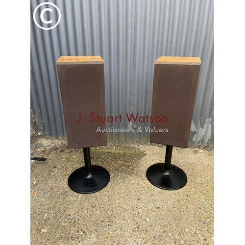 117 - A pair of bowers and Wilkins teak cased speakers on metal stands