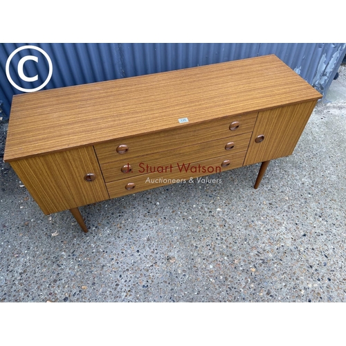 120 - A mid century teak effect sideboard