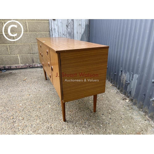 120 - A mid century teak effect sideboard