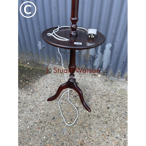 130 - A reproduction mahogany lamp table