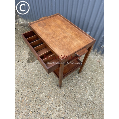 141 - A danish style teak trolley