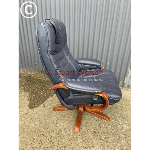 143 - A blue leather reclining easy chair