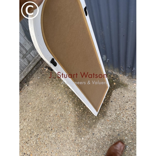 202 - A white painted arch top garden mirror. Height 123 cms.